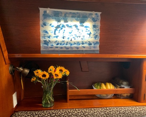 "Saloon Sunflowers Under Freshly Painted Shade" photo by Shé, Habibi 2024