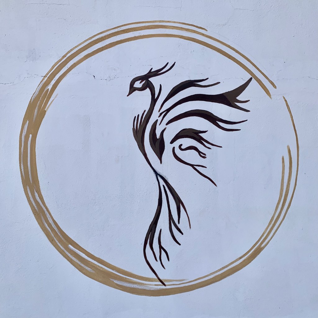 Peñasco Phoenix, artist unknown, 2’ x 2’ wall painting, photo by Shé 2025